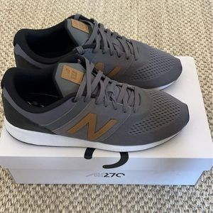 New Balance Sneakers. Mens size 11.  Grey. Very gently used, 9/10 condition